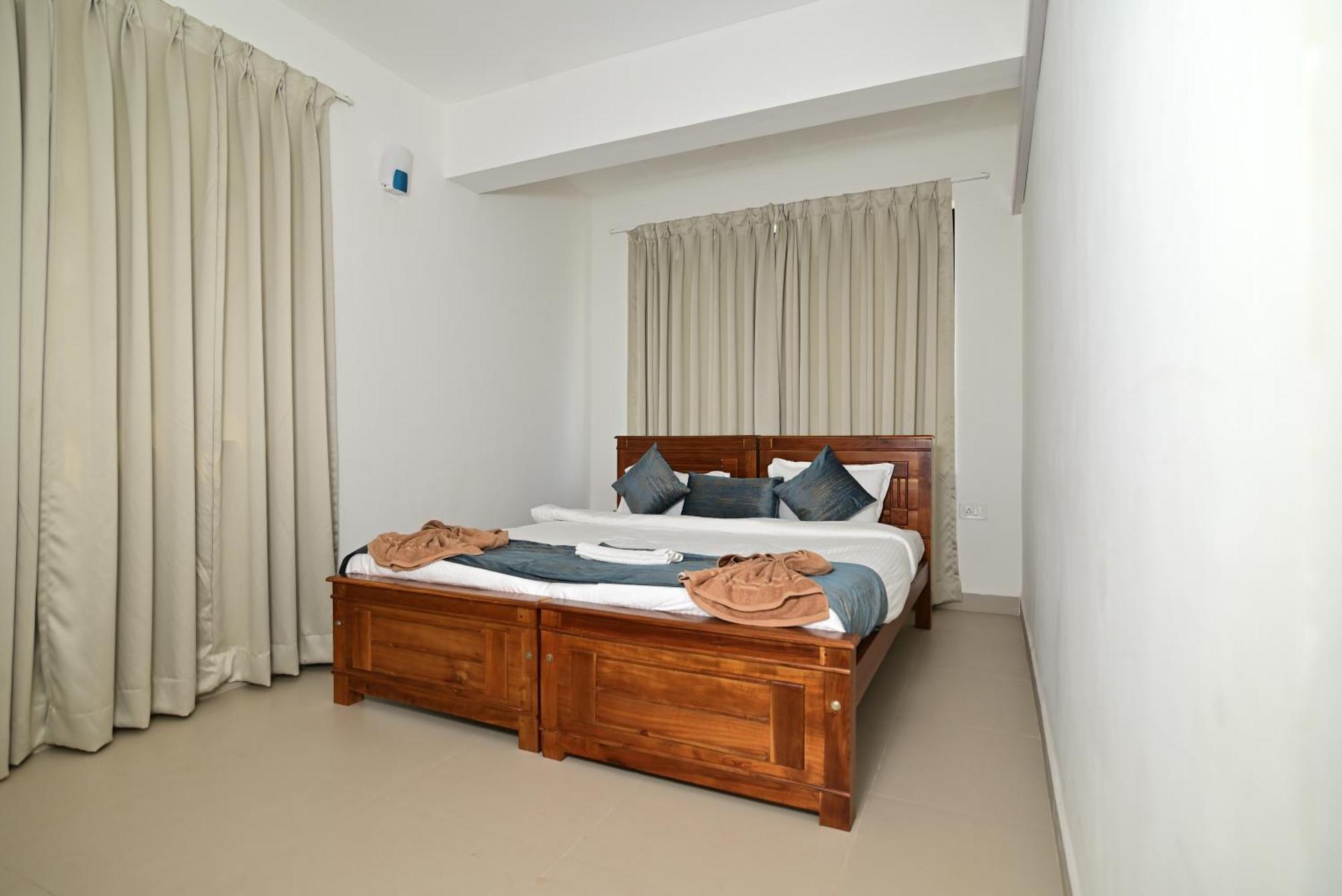 Q Lite Calangute Hotel Exterior photo